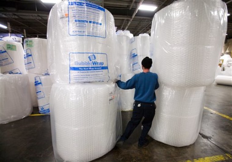 Sealed Air employee Eddie Ruiz moves rolls of Bubble Wrap at the company's plant in Saddle Brook, N.J.